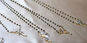 Mangalsutra Necklaces laid out on cloth